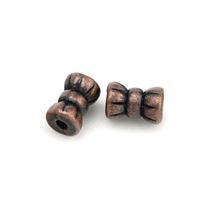 Korálky kovové STAROME 6 x 4 mm (otvor 1 mm)