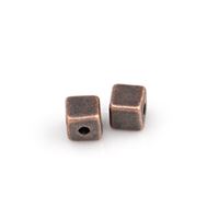 Korálky kovové STAROME 4 x 4 mm (otvor 1 mm)