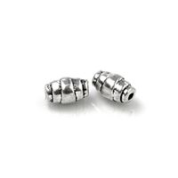 Kovové korálky 7 x 4 mm (otvor 1 mm)